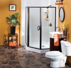 Modern bathroom with tile floor, standalone sink, and low-threshold shower.