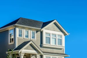 Home exterior with blue sky background